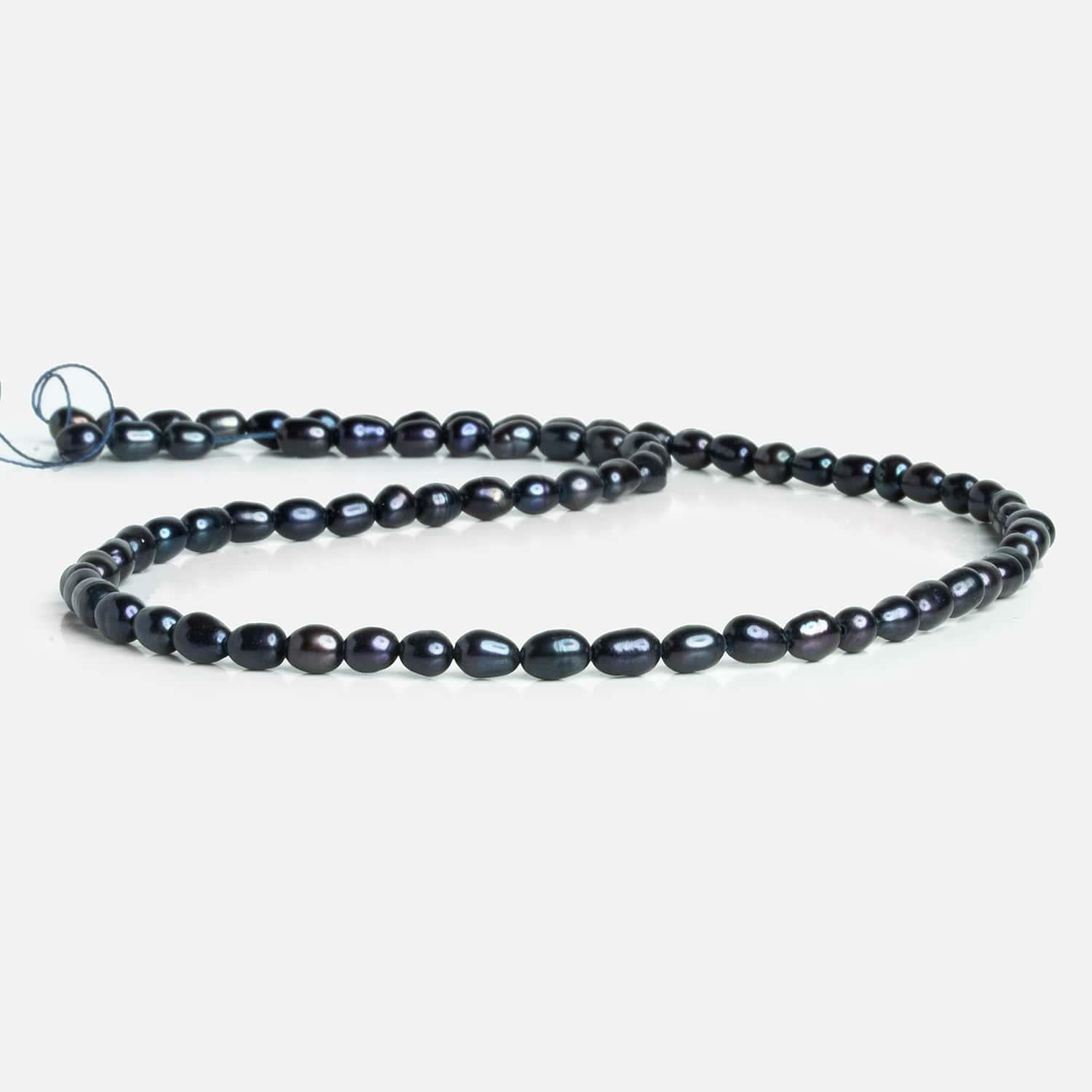 Navy Peacock Oval Freshwater Pearls 15 inch 70 pieces - The Bead Traders
