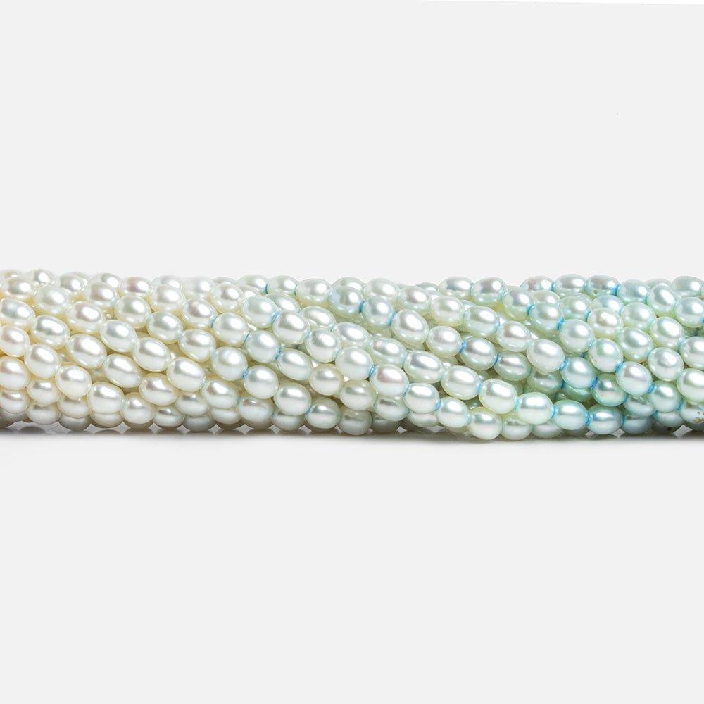 Off White & Baby Blue Straight Drill Oval Pearls 15 inch 105 pieces - The Bead Traders