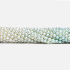 Off White & Baby Blue Straight Drill Oval Pearls 15 inch 105 pieces - The Bead Traders
