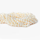 Off White Baroque Side Drilled Freshwater Pearls 16 inch 64 pieces 6x6-8x7mm - The Bead Traders