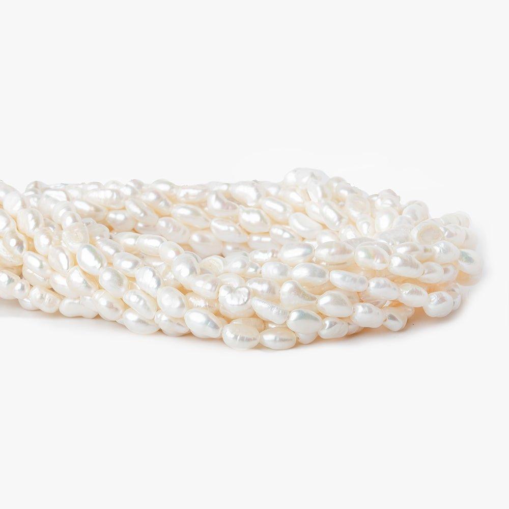 Off White Petite Baroque Freshwater Pearl 15 inch 54 pieces 6x4mm - 8x5mm - The Bead Traders