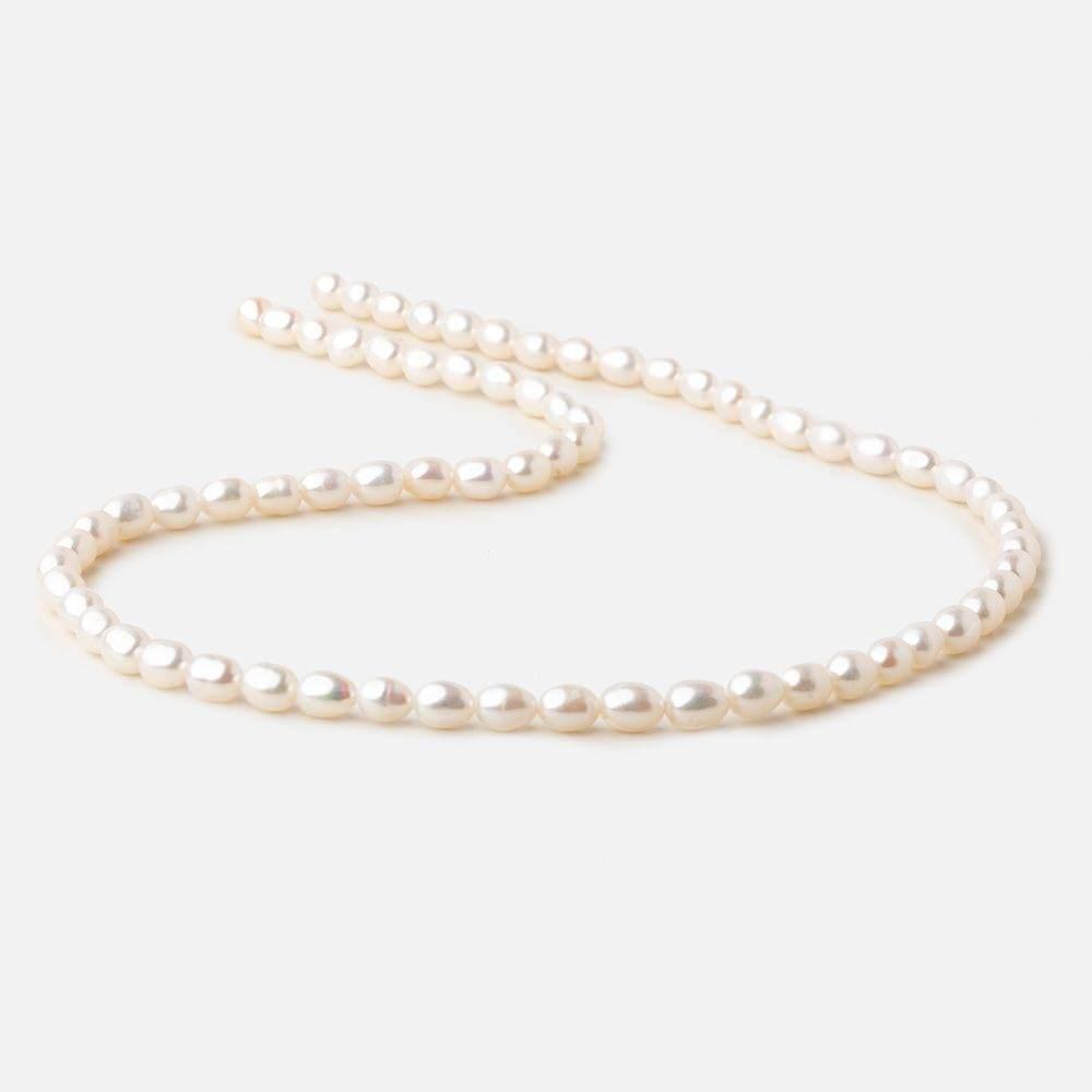 Off White Ringed Oval Freshwater Pearl Beads 15 inch 58 pieces - The Bead Traders