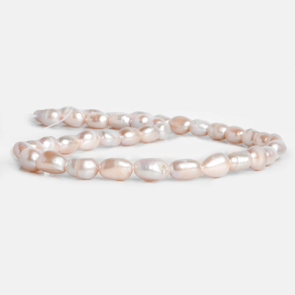 Peach Baroque Freshwater Pearls 15 inch 37 pieces - The Bead Traders