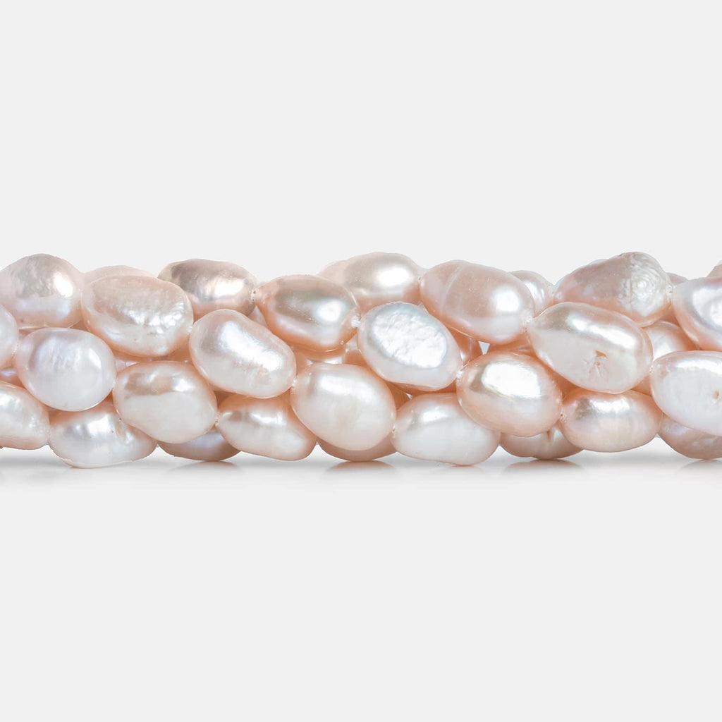 Peach Baroque Freshwater Pearls 15 inch 37 pieces - The Bead Traders