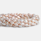 Peach Baroque Freshwater Pearls 15 inch 37 pieces - The Bead Traders