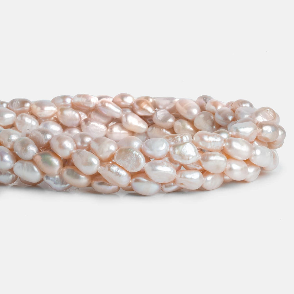 Peach Baroque Freshwater Pearls 15 inch 37 pieces - The Bead Traders