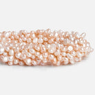 Peach Baroque Freshwater Pearls 16 inch 75 pieces - The Bead Traders
