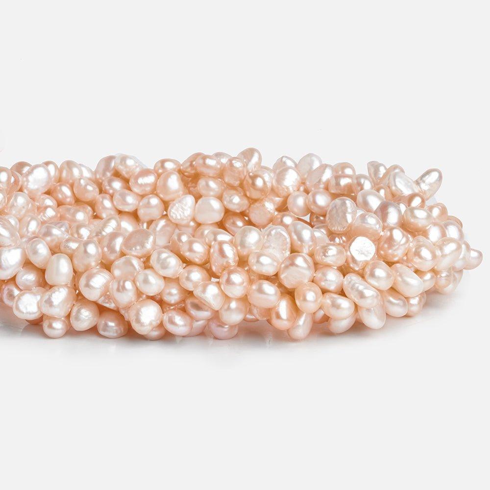 Peach Baroque Freshwater Pearls 16 inch 75 pieces - The Bead Traders
