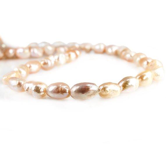 Peach Straight Drilled Baroque Freshwater Pearls 15 inch 35 pieces - The Bead Traders