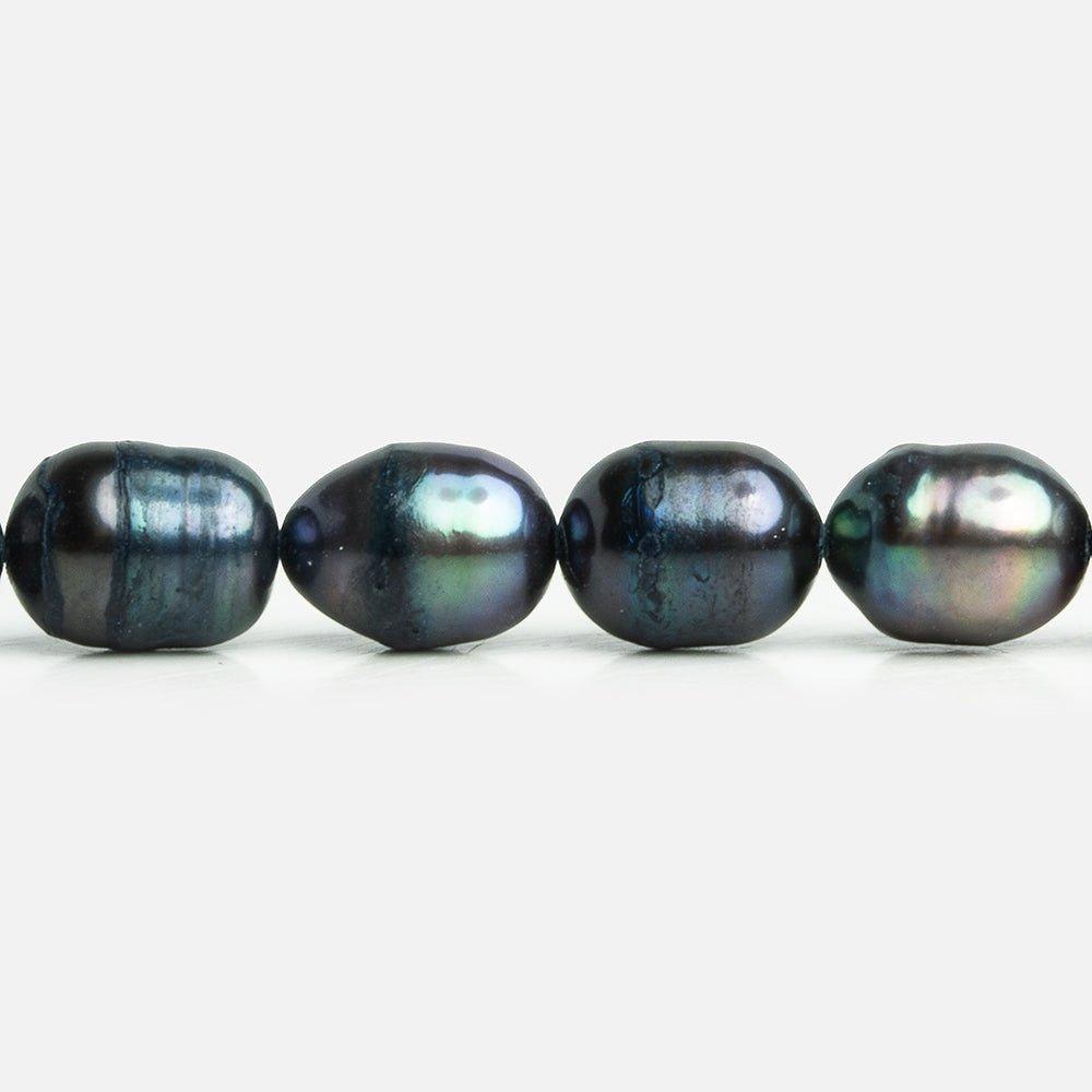 Peacock Oval Freshwater Pearls 15 inch 35 pieces - The Bead Traders