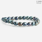 Peacock Oval Large Hole Pearls 8 inch 23 pieces - The Bead Traders