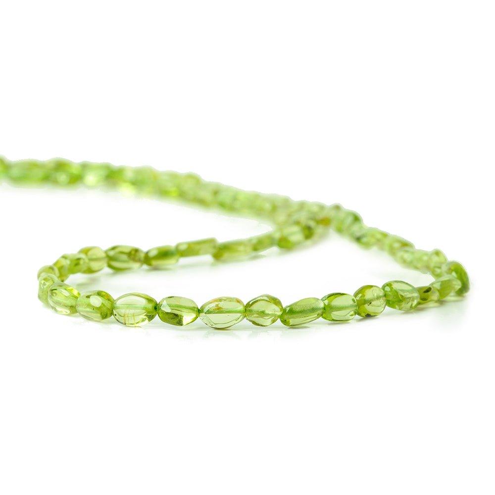 Peridot Plain Oval Beads 6x4x2mm average, 14 inches, 63 pieces - The Bead Traders