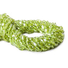 Peridot Plain Oval Beads 6x4x2mm average, 14 inches, 63 pieces - The Bead Traders