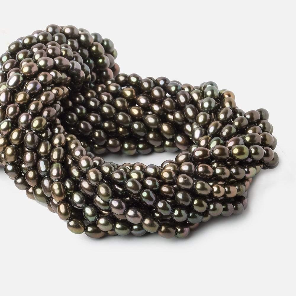 Pistachio Straight Drilled Oval Freshwater Pearl 15 inch 72 pcs - The Bead Traders