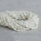 Rainbow Moonstone Plain Ovals 12 inch 26 pieces - The Bead Traders