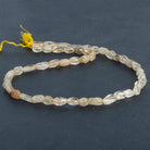 Rutilated Quartz Cornerless Rectangles 15 inch 40 beads - The Bead Traders