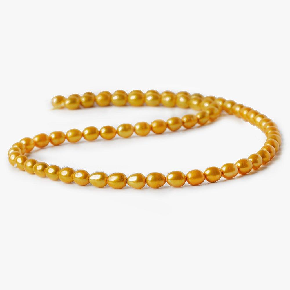 Saffron Yellow Straight Drilled Oval Freshwater Pearl 15.5" length, 6x5mm average, 67 pcs - The Bead Traders
