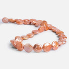 Salmon Freshwater Coin Pearls 15 inch 33 pieces - The Bead Traders