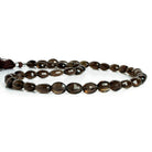 Smoky Quartz Faceted Ovals 17 inch 40 beads - The Bead Traders