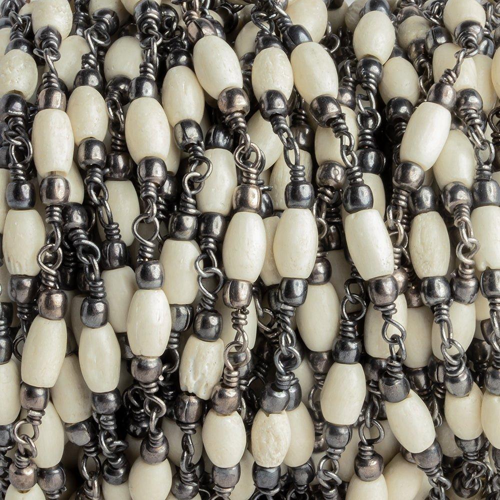 Tan Bone Barrel Black Gold Chain by the Foot 15 pieces - The Bead Traders
