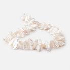 White side drilled Biwa freshwater pearls 14 inch 41 pieces 13x7-20-9mm - The Bead Traders