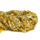 Yellow Opal Plain Nuggets 12 inch 50 beads - The Bead Traders